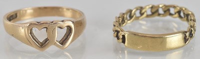 Lot 1342 - Two 9ct gold dress rings, one with open double...