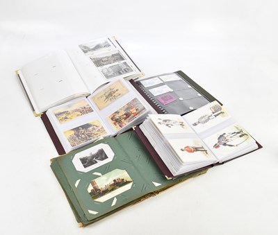Lot 1727 - Four albums of assorted postcards, including...