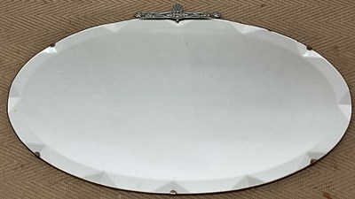 Lot 751 - An oval Art Deco style mirror, 42 x 69 cm