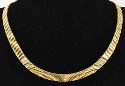 Lot 1382 - A 9ct gold braided necklace with lobster claw...