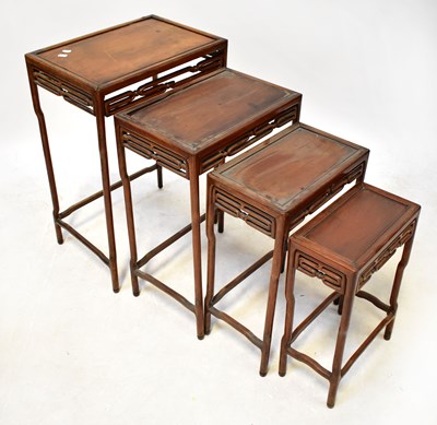 Lot 46 - A quartetto nest of Eastern hardwood tables,...