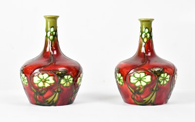 Lot 222 - MINTON; a pair of Victorian red ground...