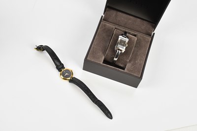 Lot 612 - GUCCI; a lady's quartz wristwatch, boxed with...