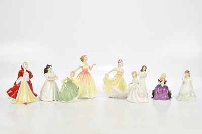 Lot 1536 - ROYAL DOULTON; nine figures comprising...