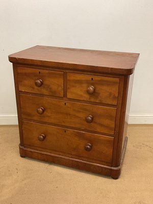 Lot 772 - A 19th century mahogany chest of two short...