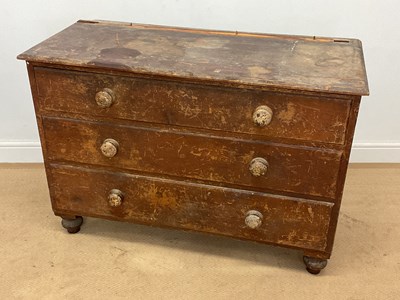 Lot 774 - A stained pine chest of three long drawers on...