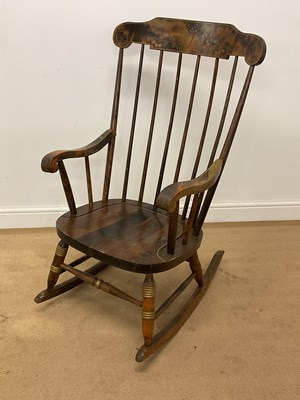 Lot 789 - A reproduction 'Boston Rocker' elm rocking...