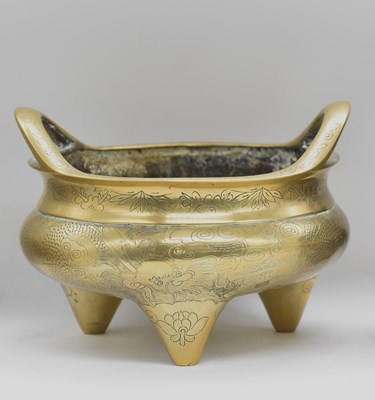 Lot 25 - A 19th century Chinese engraved polished brass...