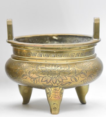 Lot 34 - A 19th century Chinese engraved brass twin...