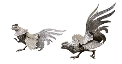 Lot 836 - A pair of Japanese white metal fighting...