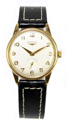 Lot 1699 - LONGINES; a gentleman's 9ct gold cased...