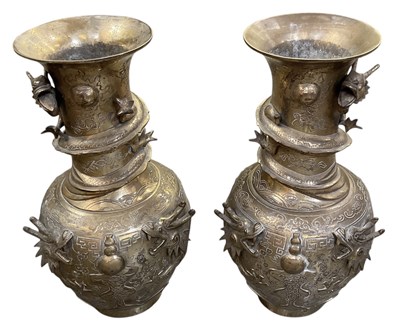 Lot 789 - A pair of early 20th century Chinese brass...