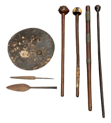 Lot 767 - Three African knobkerries, one with studded...