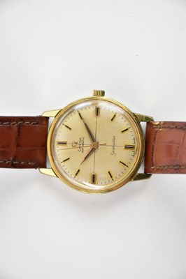 Lot 574 - OMEGA; a gentleman's vintage gold plated and...