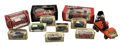 Lot 604 - Eleven boxed model vehicles comprising a 1:16...