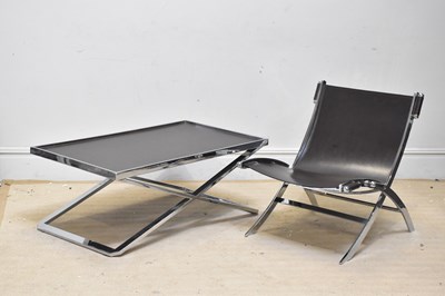 Lot 2021 - A contemporary chrome framed brown leather...
