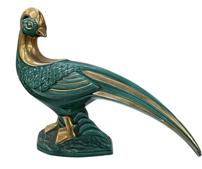 Lot 682 - A 1930s Art Deco blue glazed and gilt...