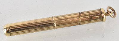 Lot 1206 - A 9ct yellow gold cigar piercer, hallmarked...