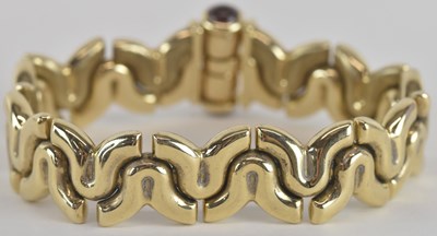 Lot 1576 - CHIAMPESAN; a 9ct yellow gold stylish flat...
