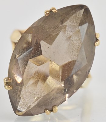 Lot 1348 - A 9ct yellow gold ring set with large smoky...