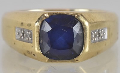 Lot 1257 - A 9ct yellow gold sapphire and diamond set...