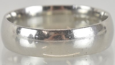 Lot 1258 - A 950 grade platinum wedding band, size U,...