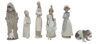 Lot 644 - LLADRÓ; three porcelain figures comprising...
