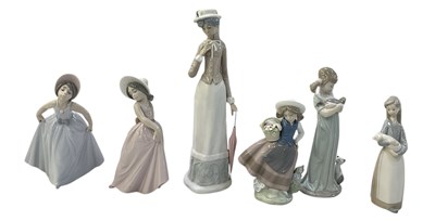 Lot 647 - LLADRÓ; five porcelain figures of young girls,...