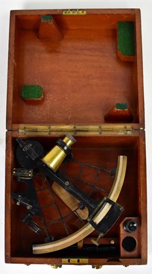 Lot 235 - A wooden cased sextant.