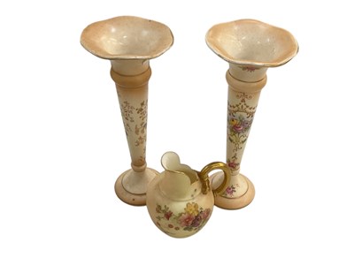 Lot 680 - ROYAL WORCESTER; a small blush ivory hand...