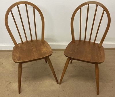 Lot 702 - ERCOL; a pair of hoop back chairs, height 85cm.