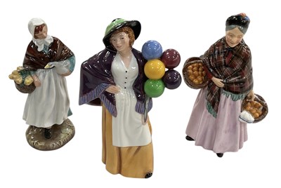 Lot 681 - ROYAL DOULTON; a group of three ceramic...