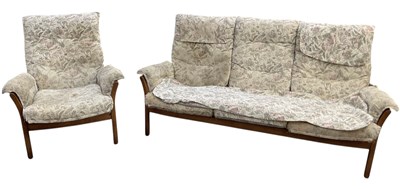 Lot 51 - ERCOL; a mid century medium elm floral...