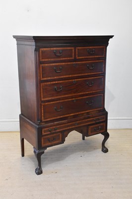 Lot 2127 - A 19th century inlaid mahogany chest on stand,...