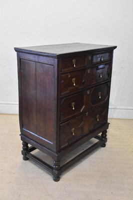 Lot 2050 - An early 18th century and later oak chest on...