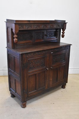 Lot 2063 - A 17th century style oak court cupboard, with...