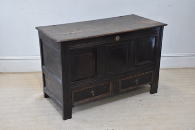Lot 2062 - An 18th century oak mule chest, the hinged top...
