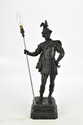 Lot 2384 - A black painted spelter figural lamp, modelled...