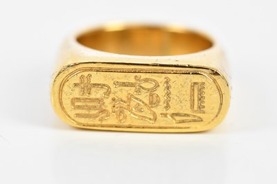 Lot 200 - A yellow metal signet ring with Egyptian...
