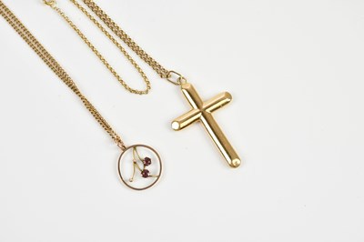 Lot 378 - A 9ct yellow metal crucifix suspended on a...