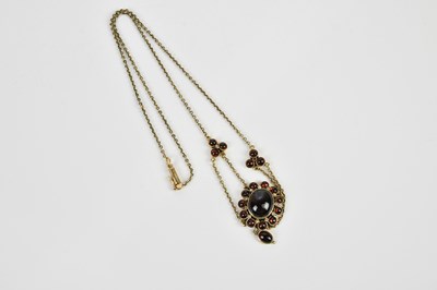 Lot 365 - A Victorian garnet and seed pearl necklace...