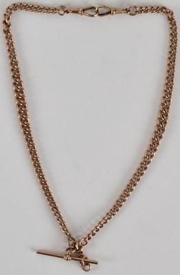 Lot 1380 - A 9ct rose gold watch chain, with T-bar and...