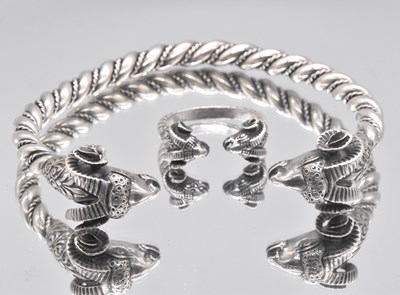 Lot 590 - A white metal wrythen twisted ram's head...