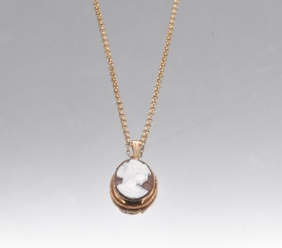 Lot 585 - A 9ct yellow gold chain, suspending a 9ct gold...