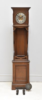 Lot 1005 - An Art Nouveau carved and panelled oak...