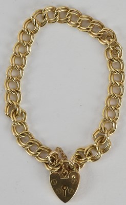 Lot 1590 - A 9ct gold double circle link bracelet, united...