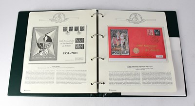 Lot 963 - An album of coin cover collections, including...