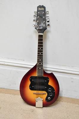 Lot 1120 - MAESTRO; a solid body electric mandolin, boxed.
