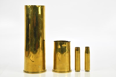 Lot 2466 - Two polished artillery shell cases, largest...