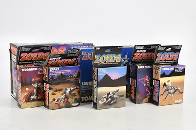 Lot 2440 - TOMY; a collection of 'Zoids' action figures,...